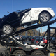 Illustration for article titled This Is What Happens When A Car Carrier Hits The Bottom Of A Bridge